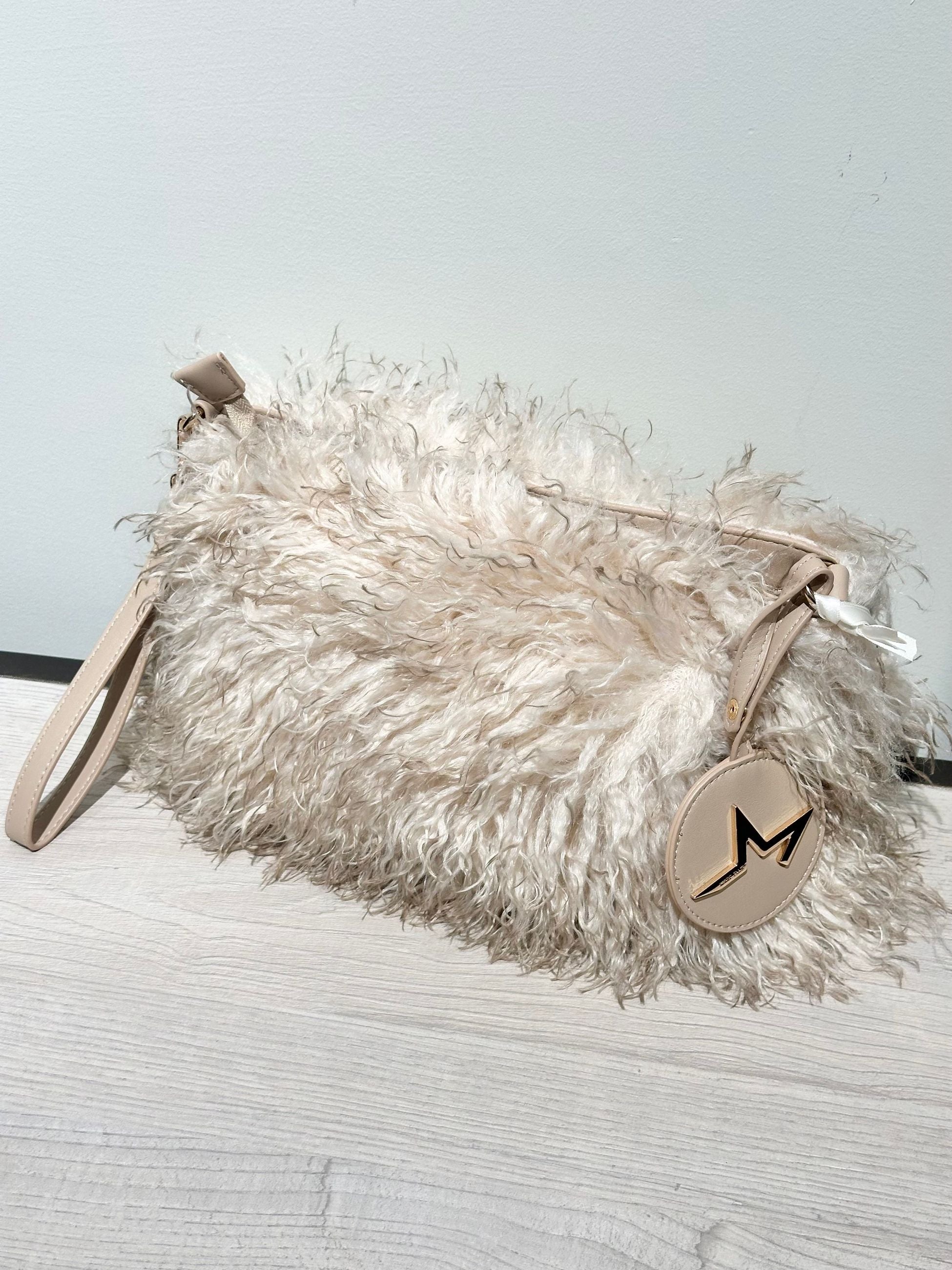 Marc Ellis Pochette