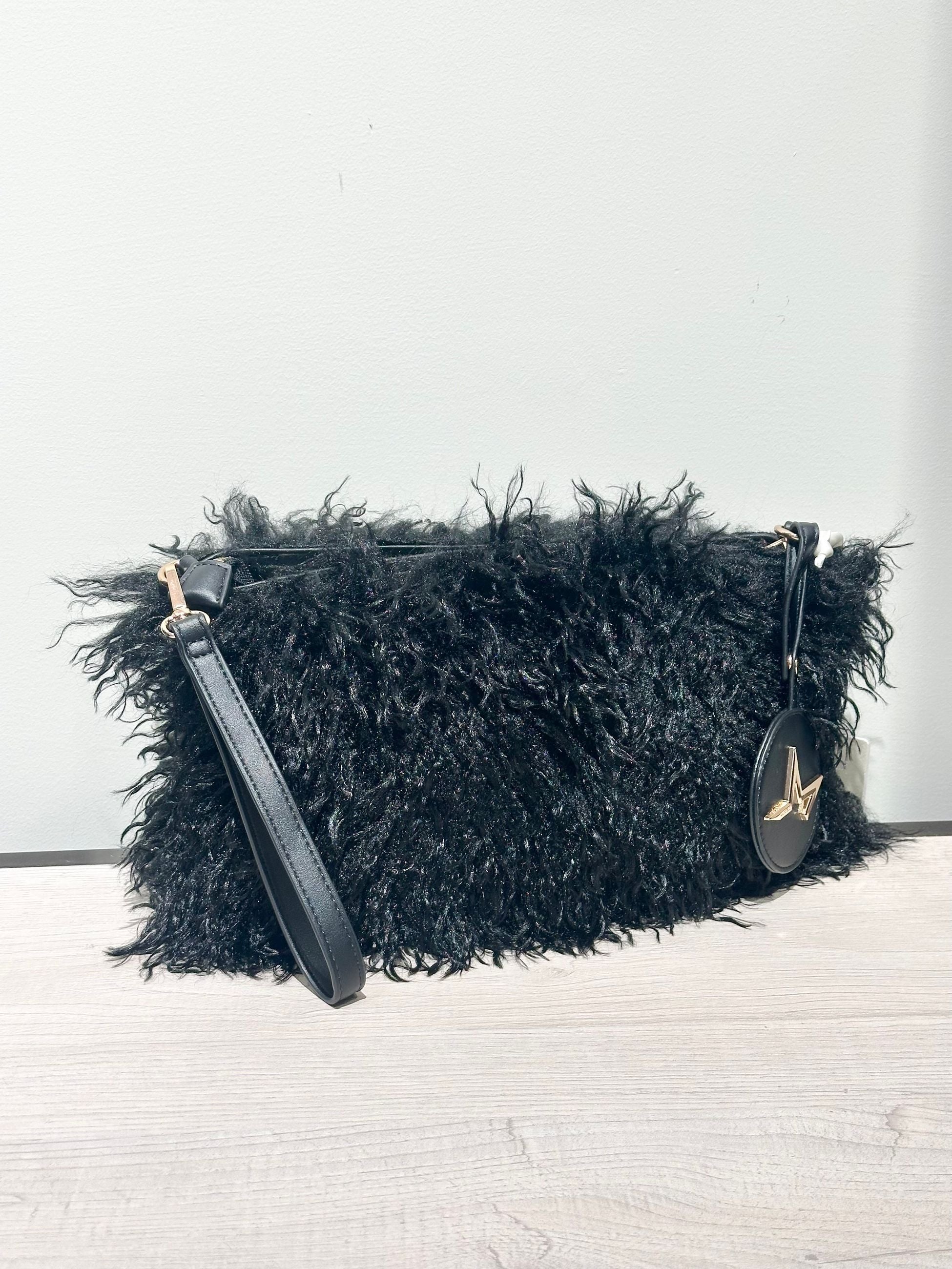 Marc Ellis Pochette