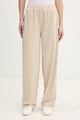 Tommy Jeans Joggers Relaxed Fit in Maglia con Distintivo
Beige