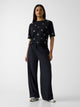 Guess Pantalone Parachute con Logo Stampato