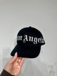 Palm Angels Cappello da Baseball con Maxi Logo Gotico Avvolgente Nero
